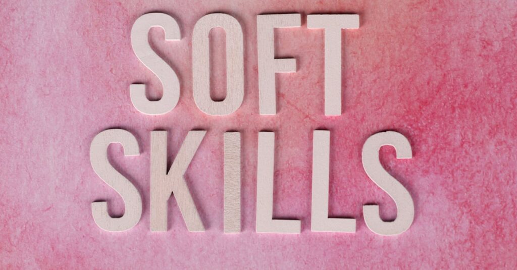 Text 'Soft Skills' on a pink watercolor background for educational and business themes.